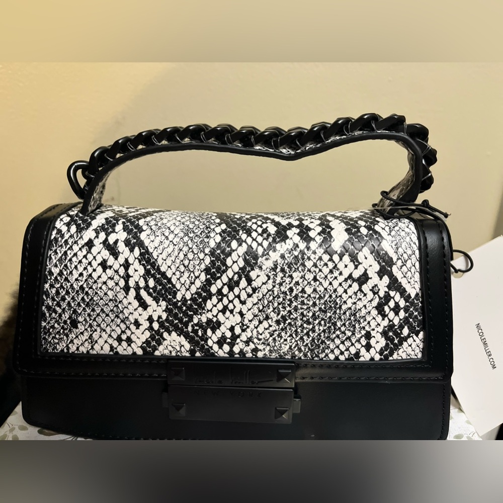 🆕. Nicole Miller animal print Black and white purse. NWT